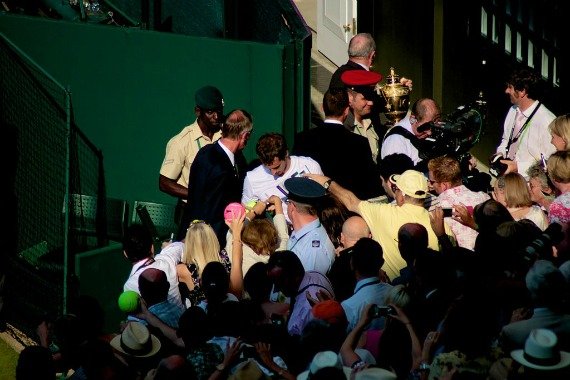 A popular man. Murray signing autographs after his 2013 win.