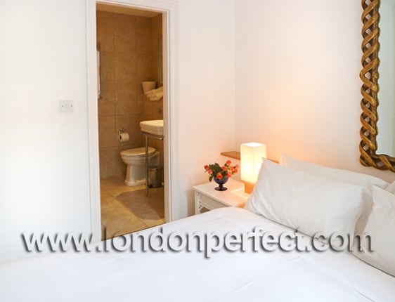 17 En Suite Bathroom Tiled In Beige Marble