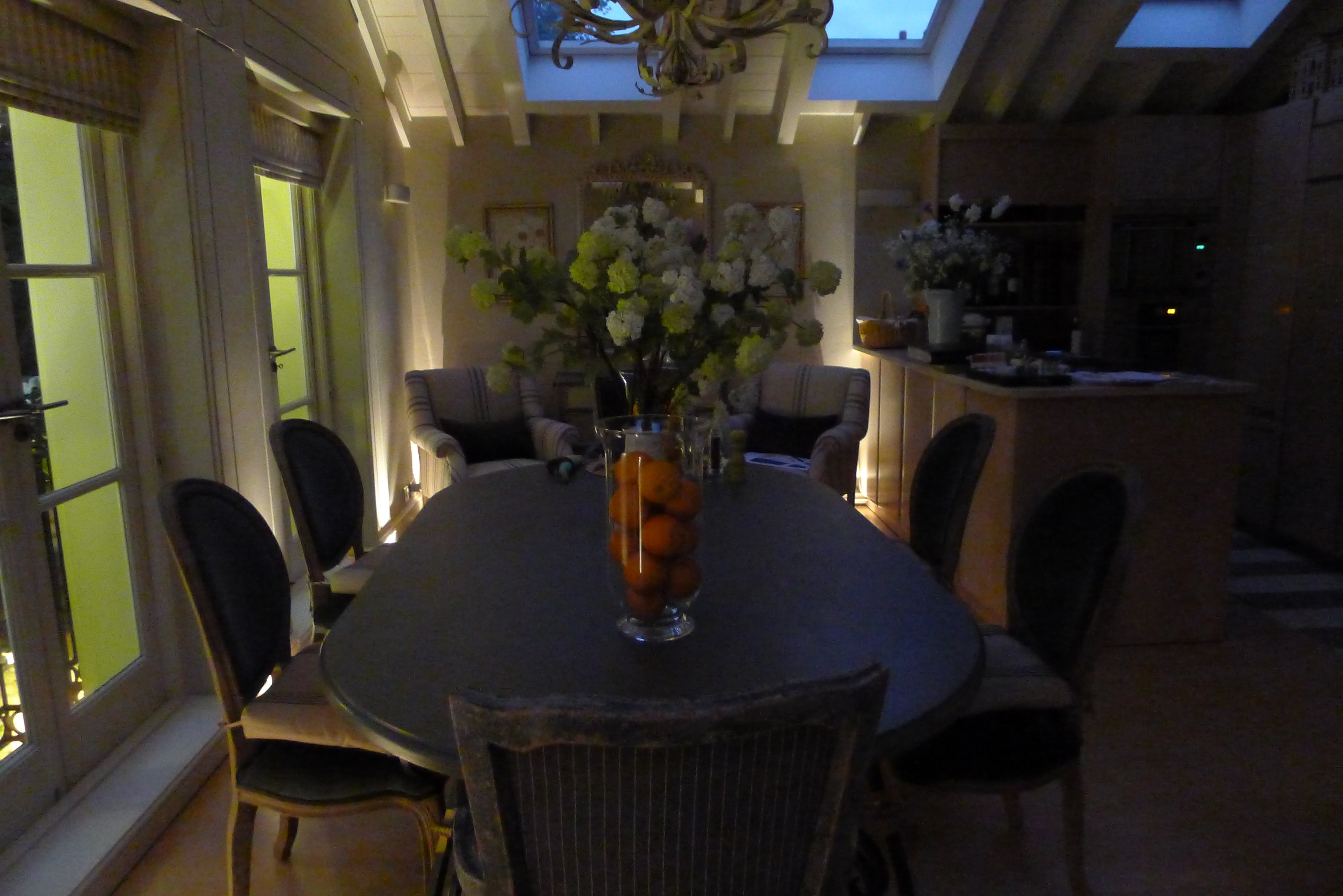 kitchen uplights Soft Uplights along dining room walls add height and depth