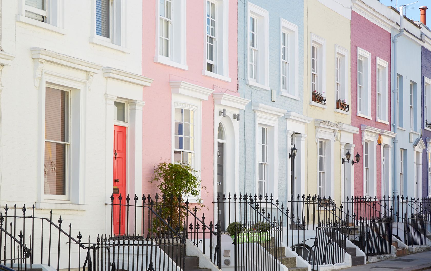 Row of pastel coloured houses in Notting Hill