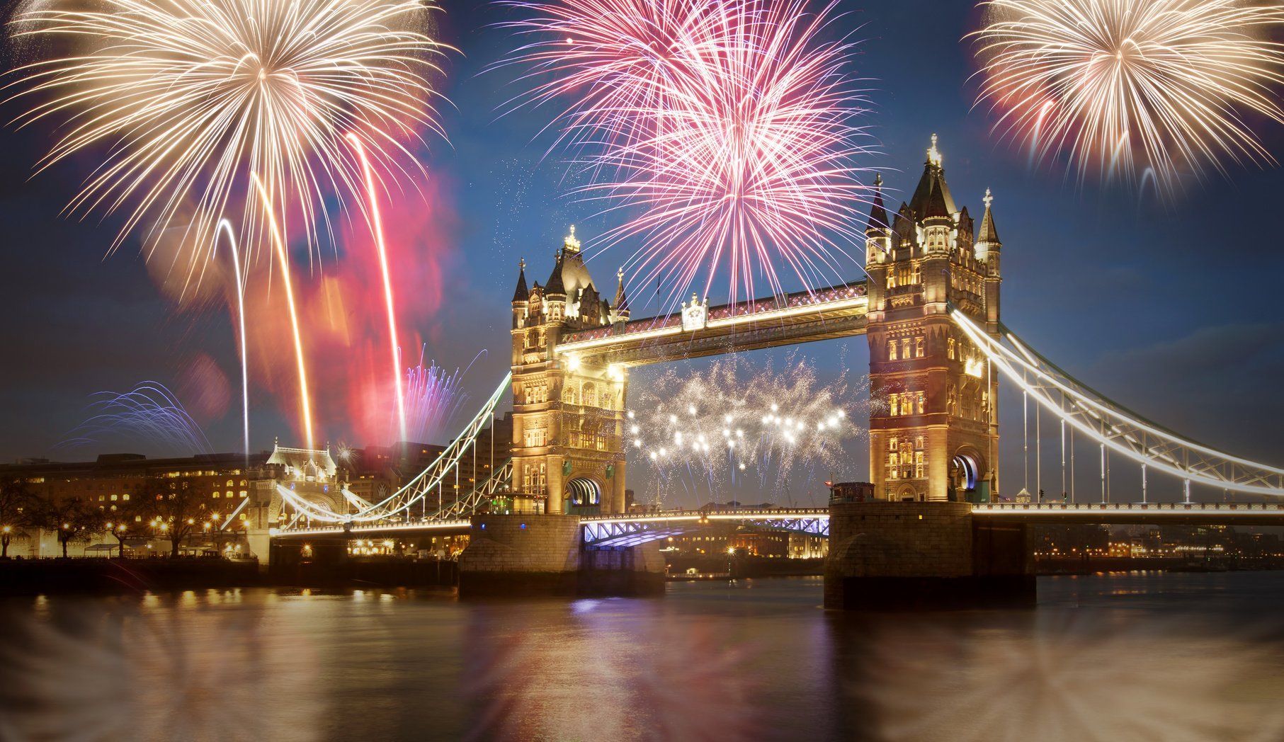 Tower bridge with firework, celebration of the New Year in London, UK.